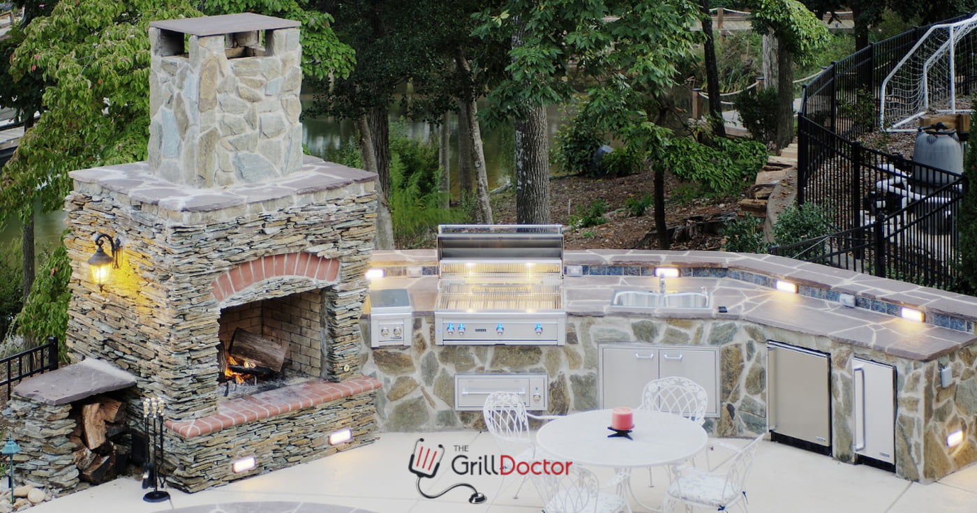 Outdoor Kitchen Fireplace with Built in Gill and Waterfall