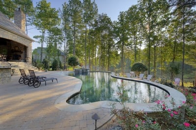 Stone patio by pool